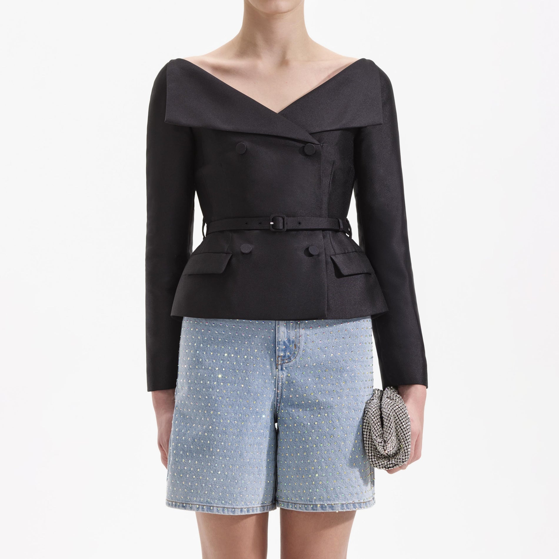 A close up of a woman wearing the Black Taffeta Jacket