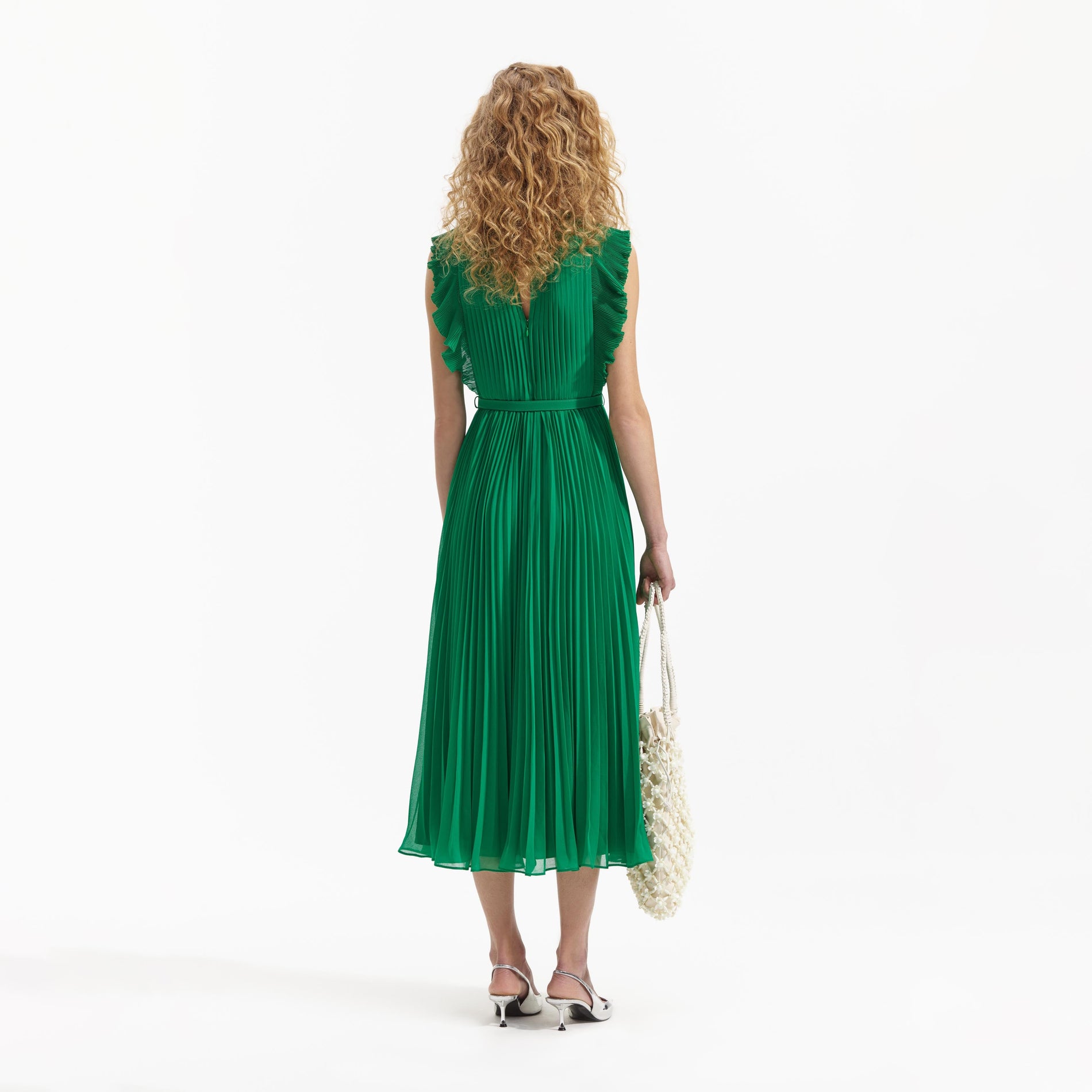 A Woman wearing the Green Chiffon Sleeveless Ruffle Midi Dress
