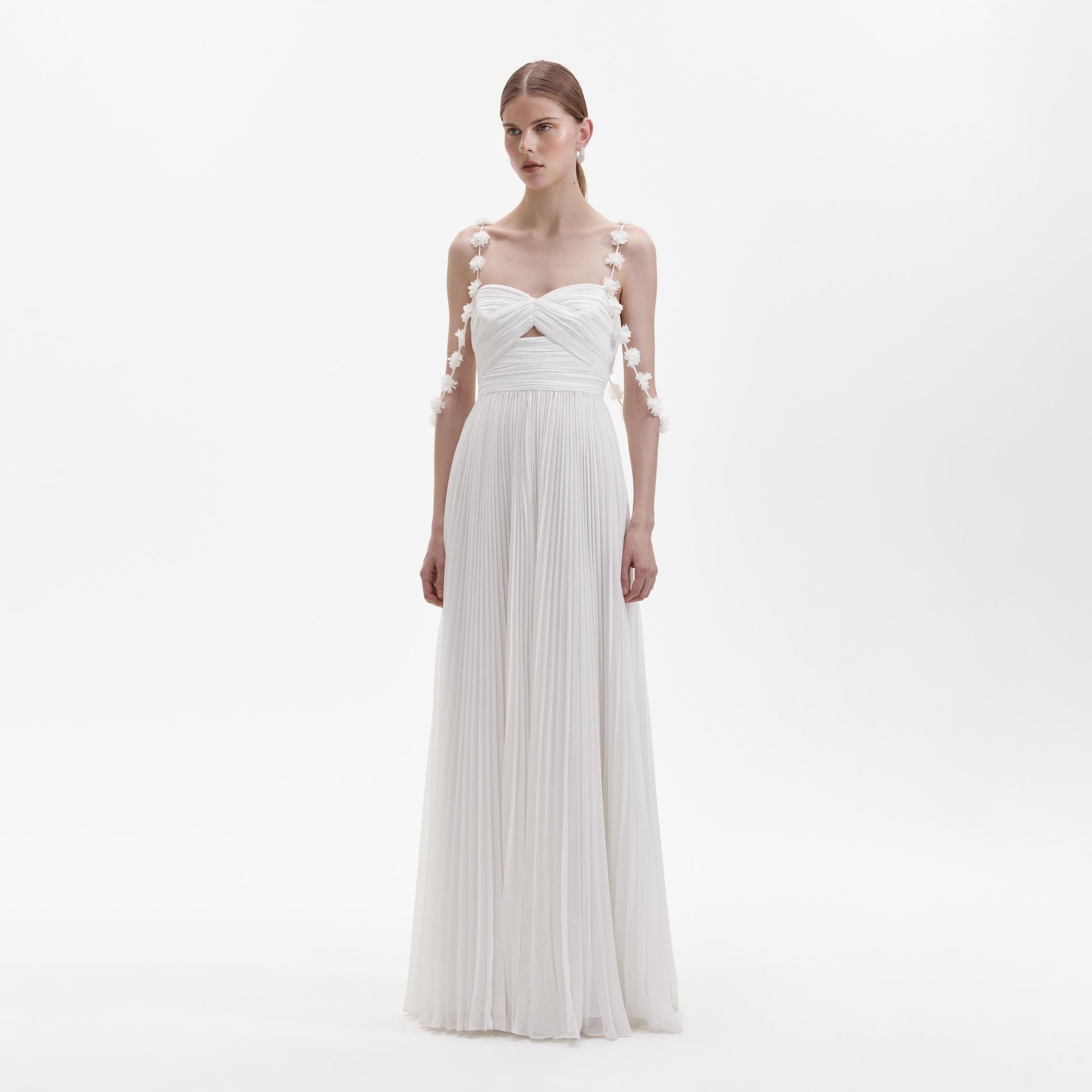 Side view of a woman wearing the White Chiffon Flower Maxi Dress