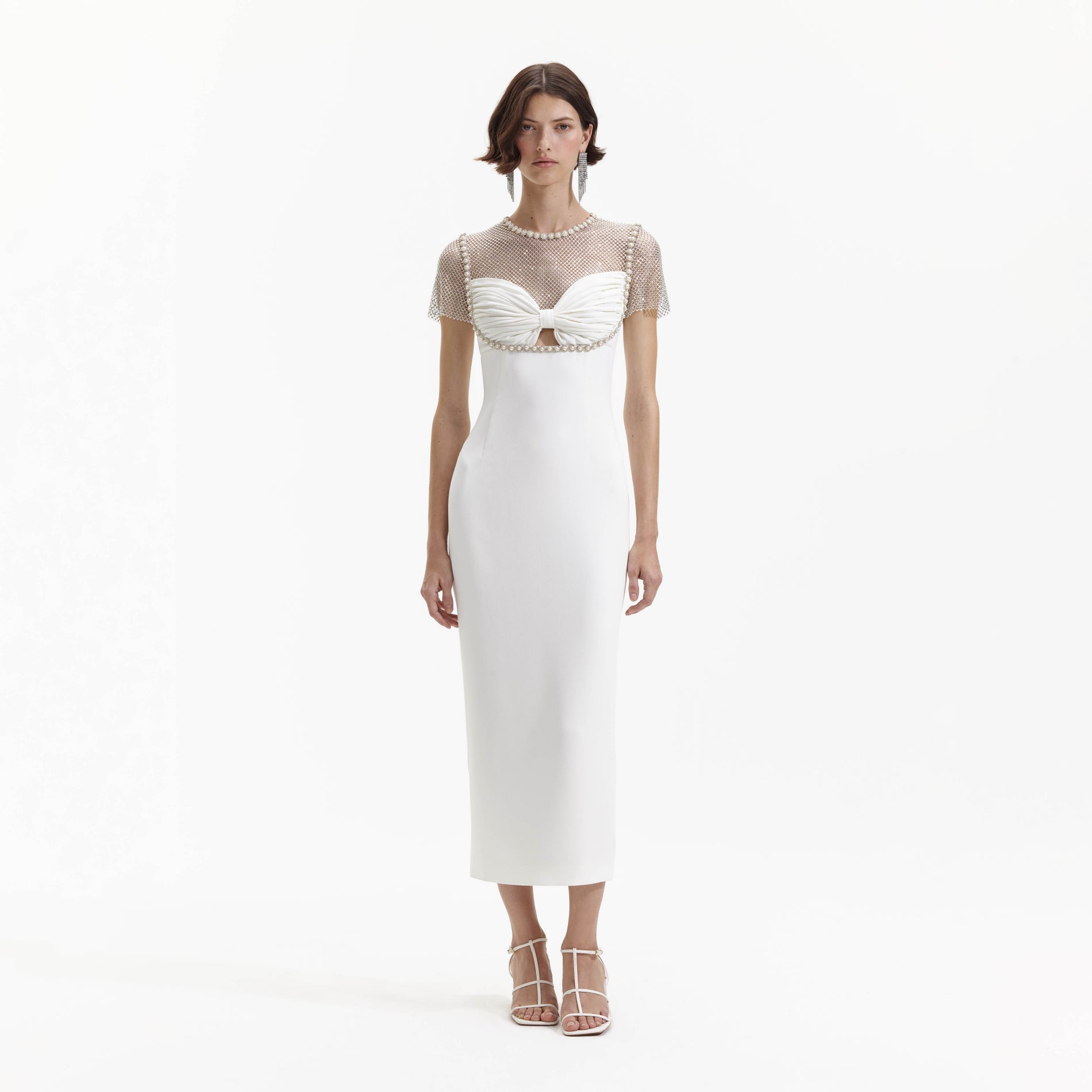 A Woman wearing the White Diamante Crepe Midi Dress