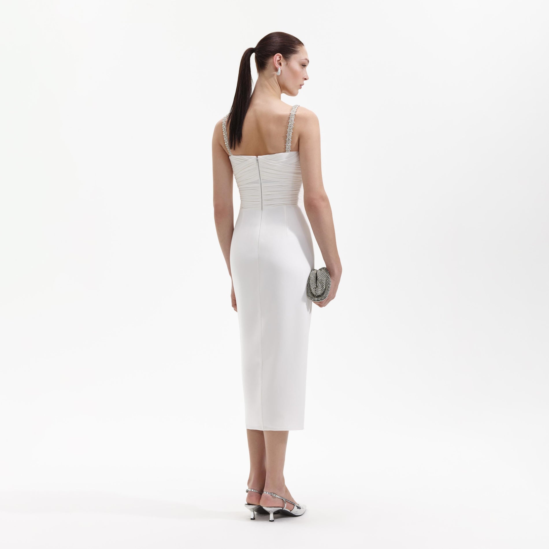 A Woman wearing the White Stretch Crepe Diamante Midi Dress