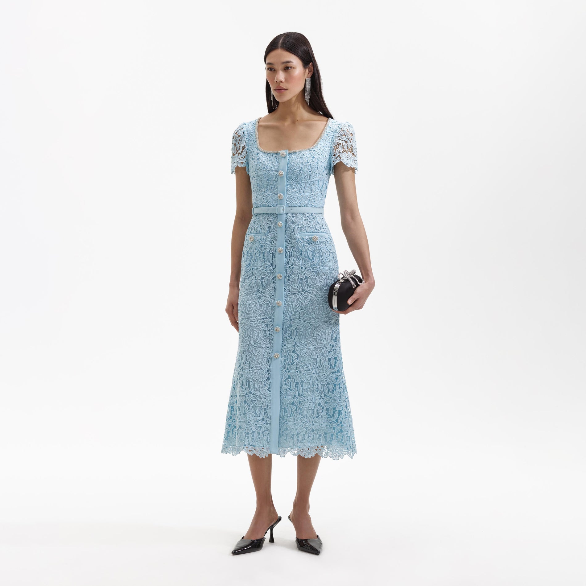 Side view of a woman wearing the Blue Lace Diamante Midi Dress