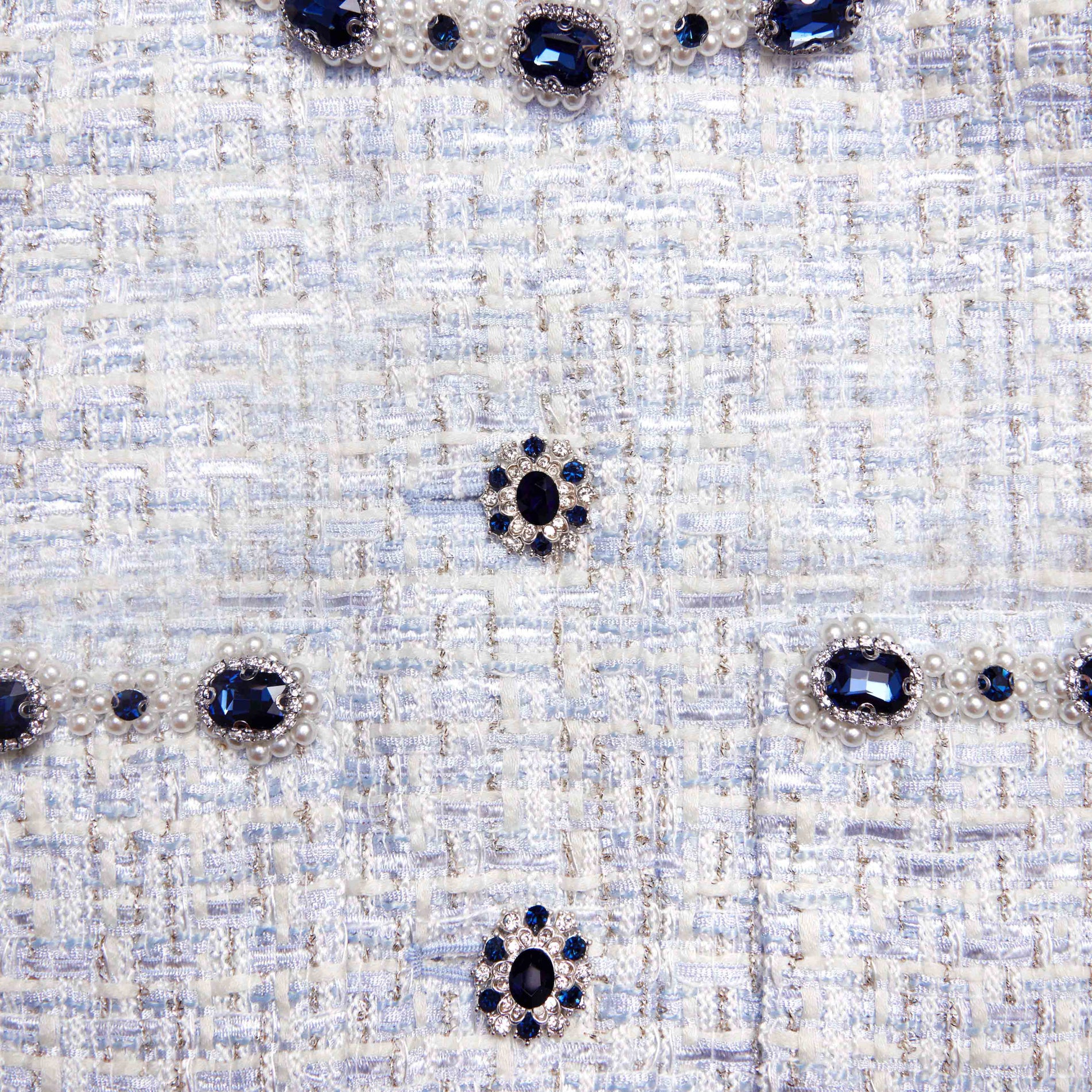 Side view of a woman wearing the Blue Boucle Jacket