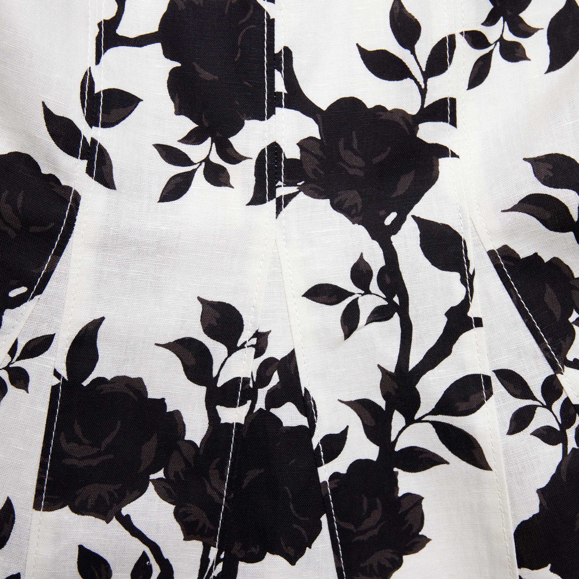 Side view of a woman wearing the Floral Print Linen Midi Dress