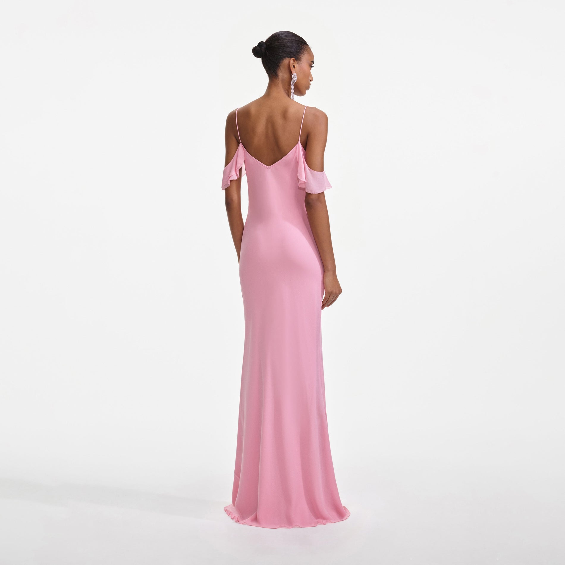 Back view of a woman wearing the Pink Georgette Flower Maxi Dress