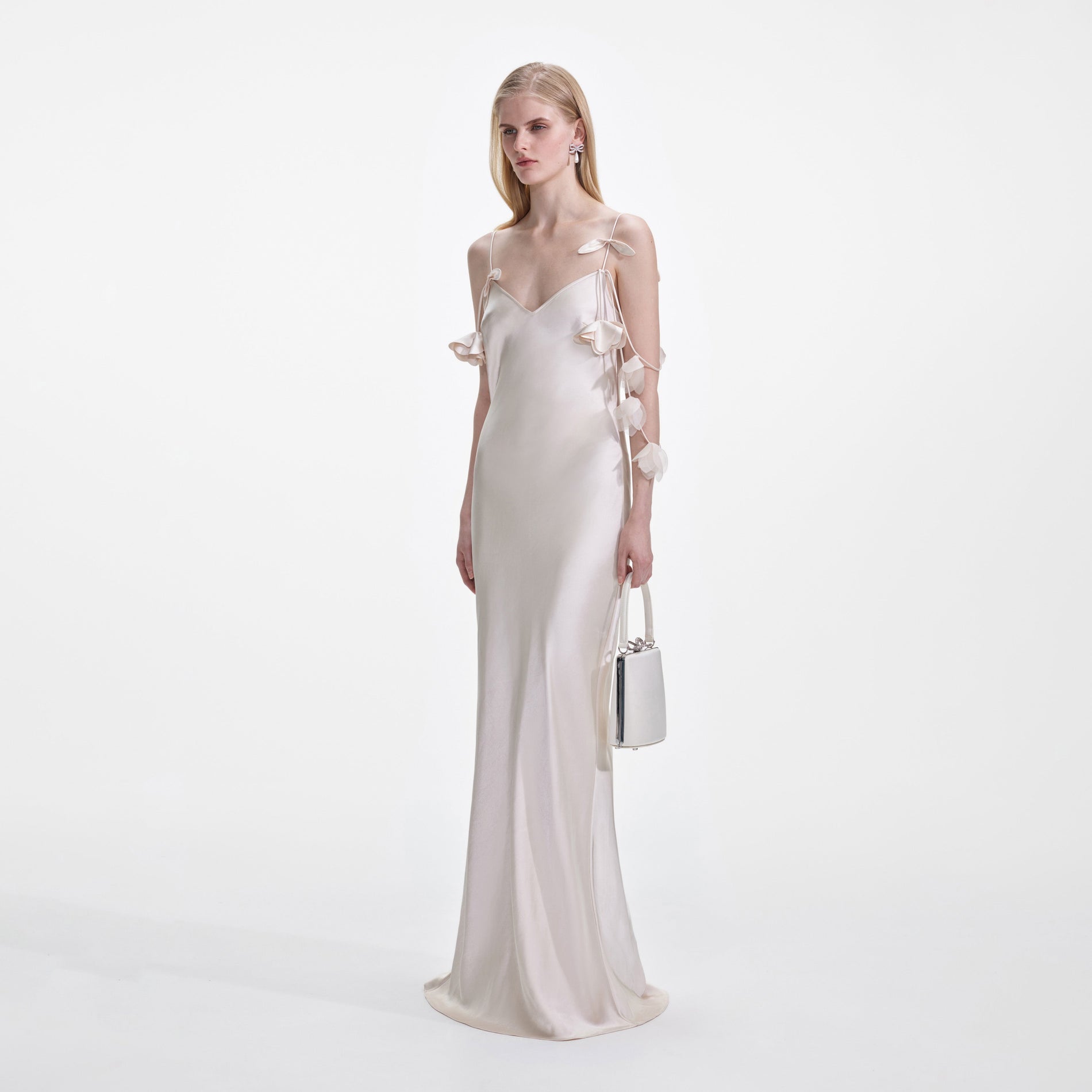 Side view of a woman wearing the Champagne Flower Satin Maxi Dress