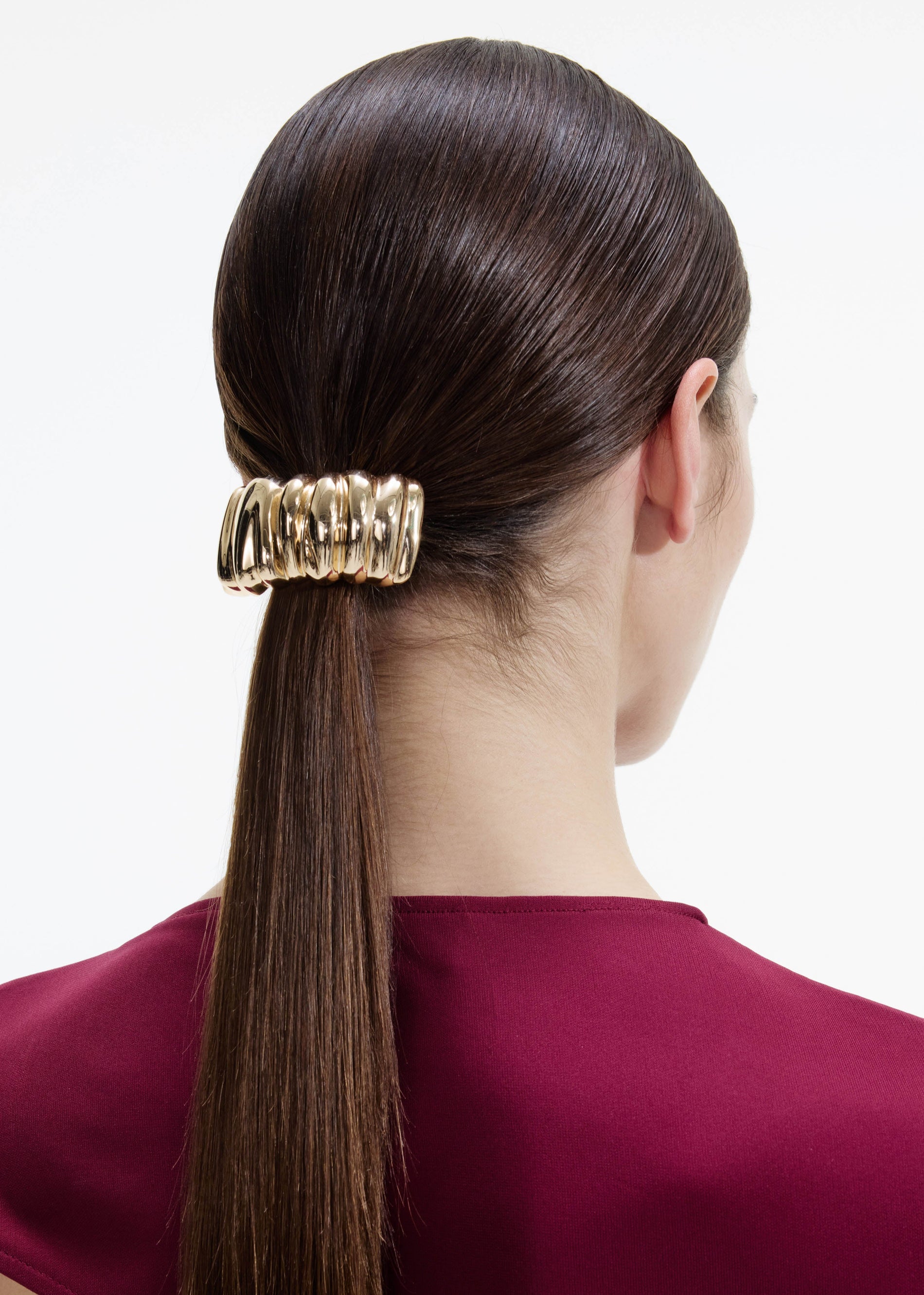 A photo of the Mottled Gold Hair Cuff