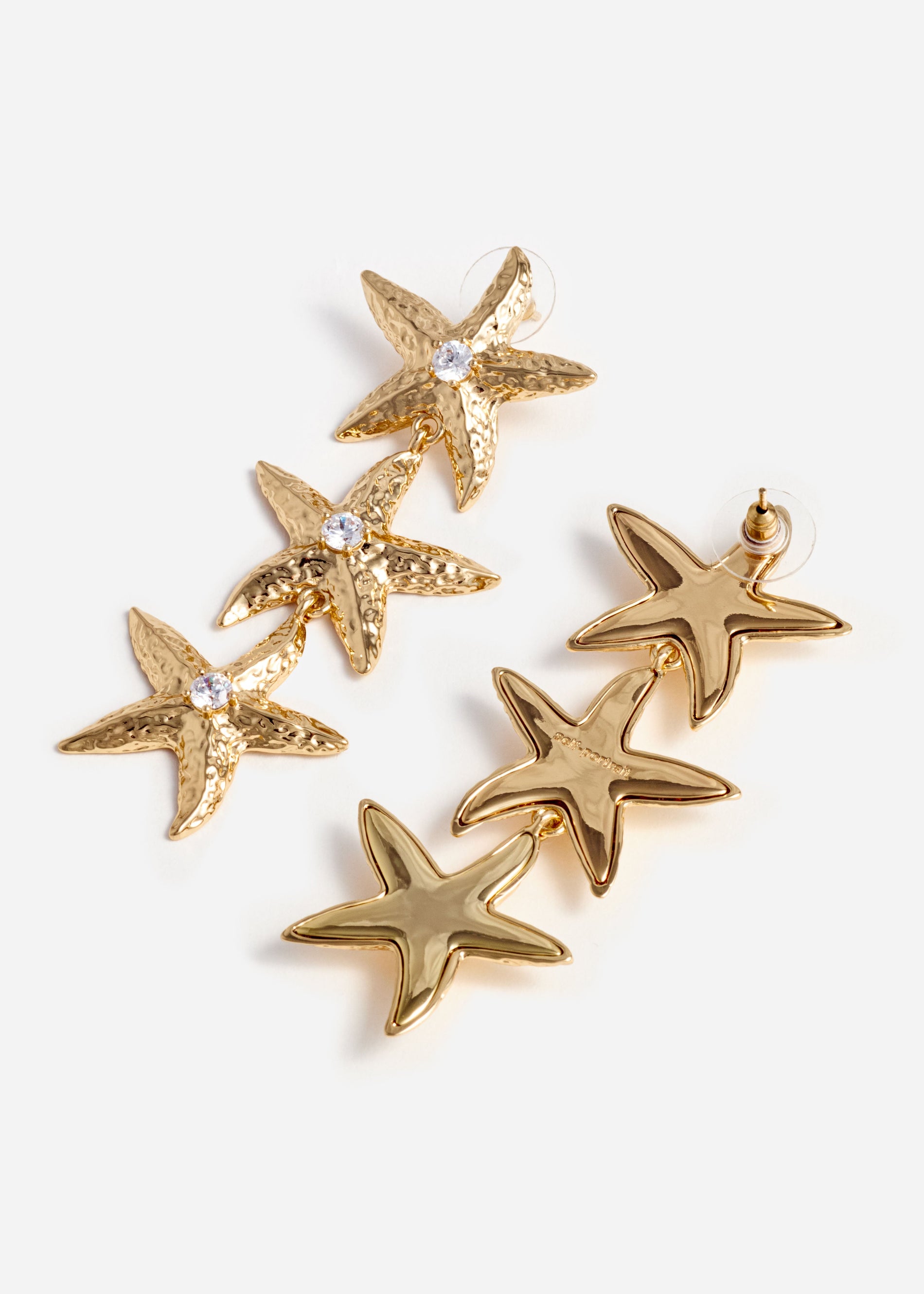 A photo of the Mottled Gold Sea Star Earrings