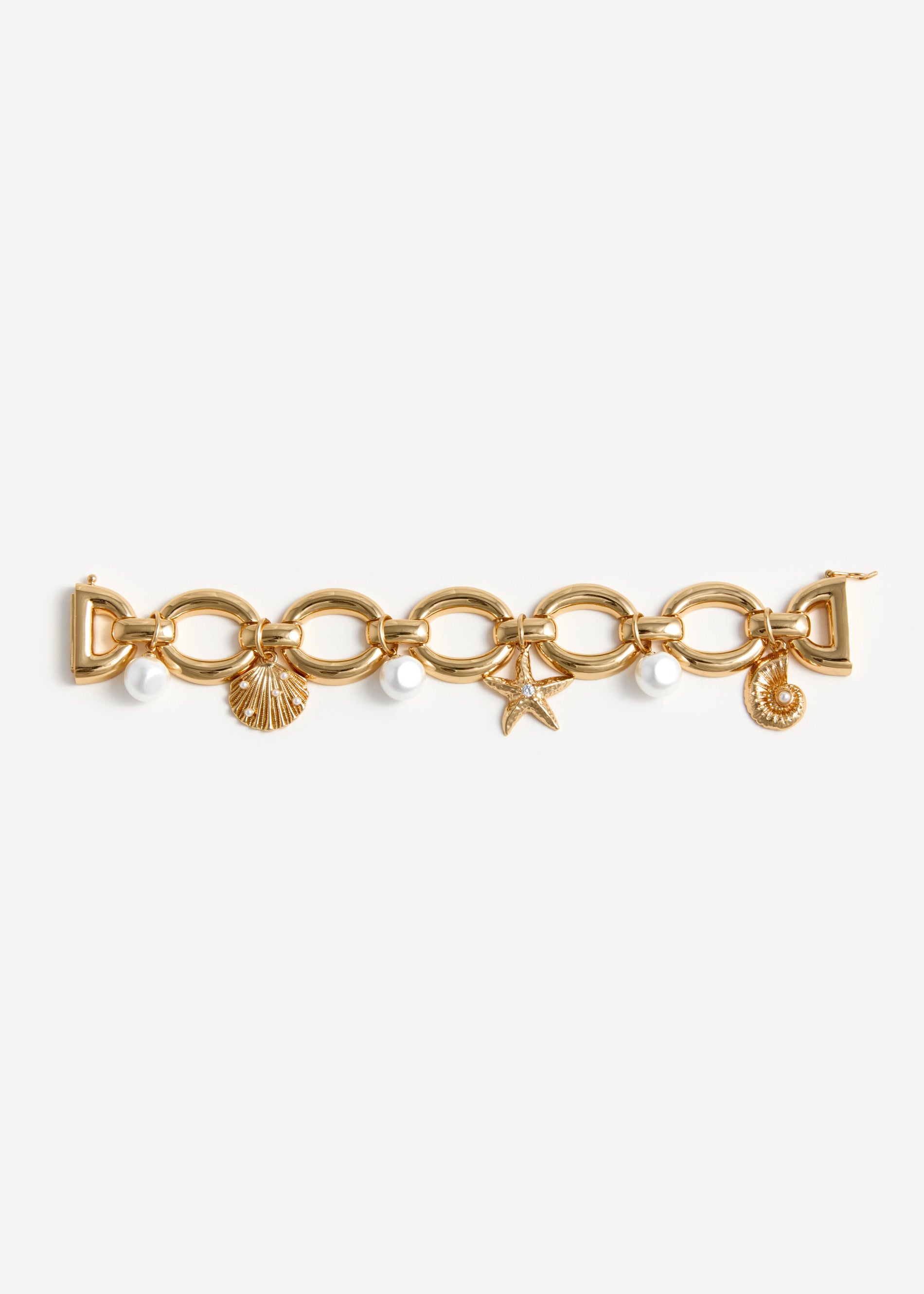 A photo of the Gold Pearl Shell Charm Bracelet