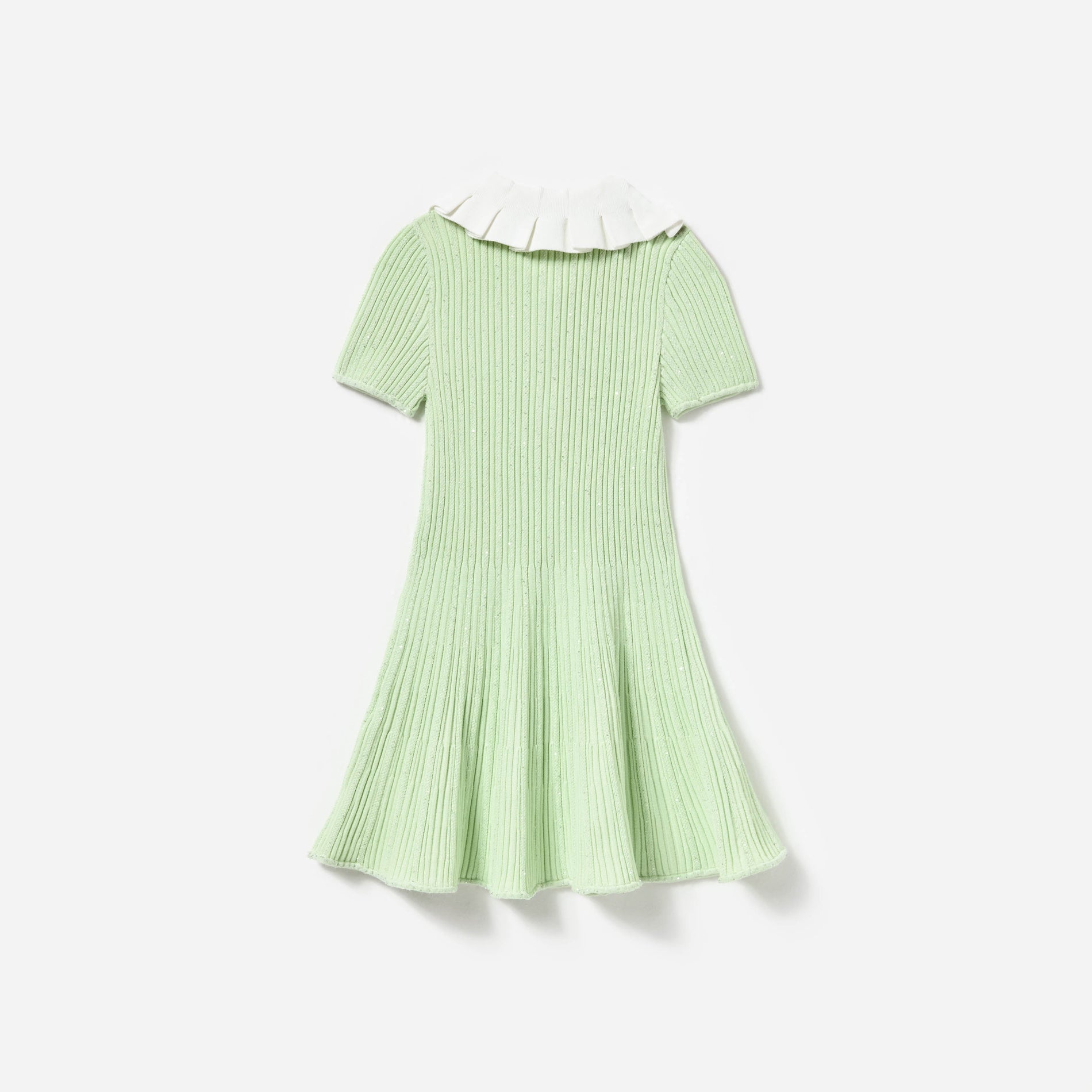Side view of a woman wearing the Green Ribbed Knit Dress