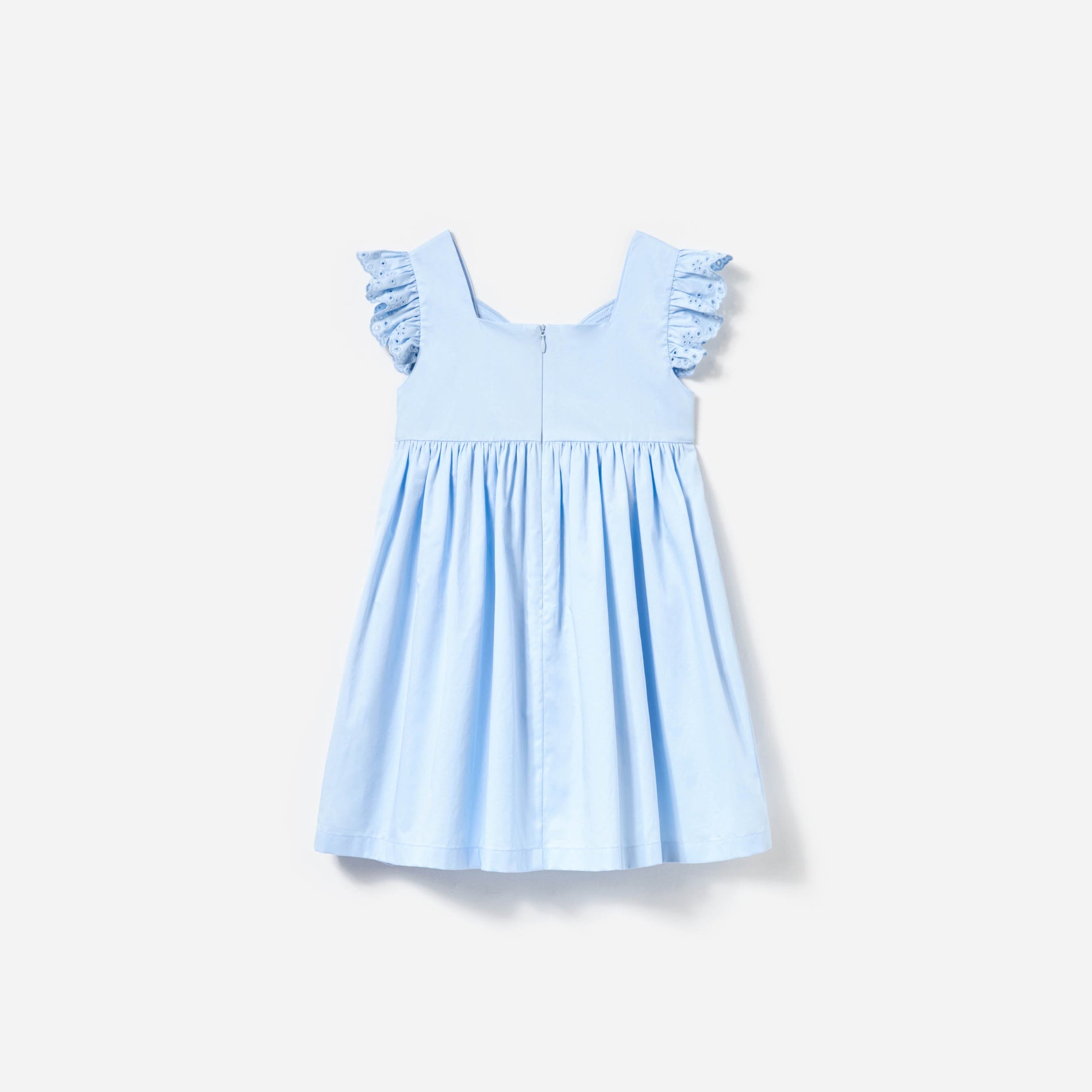 Side view of a woman wearing the Blue Cotton Butterfly Dress