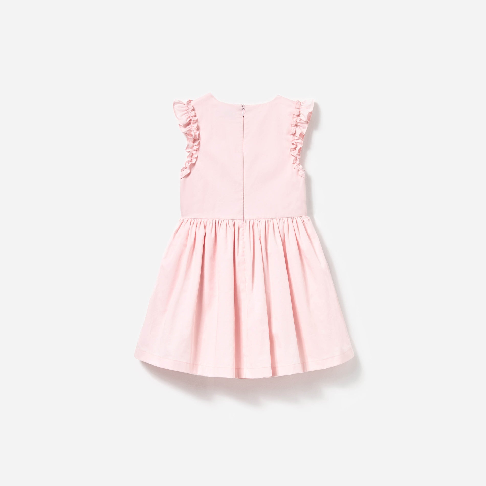 Side view of a woman wearing the Pink Cotton Flower Dress