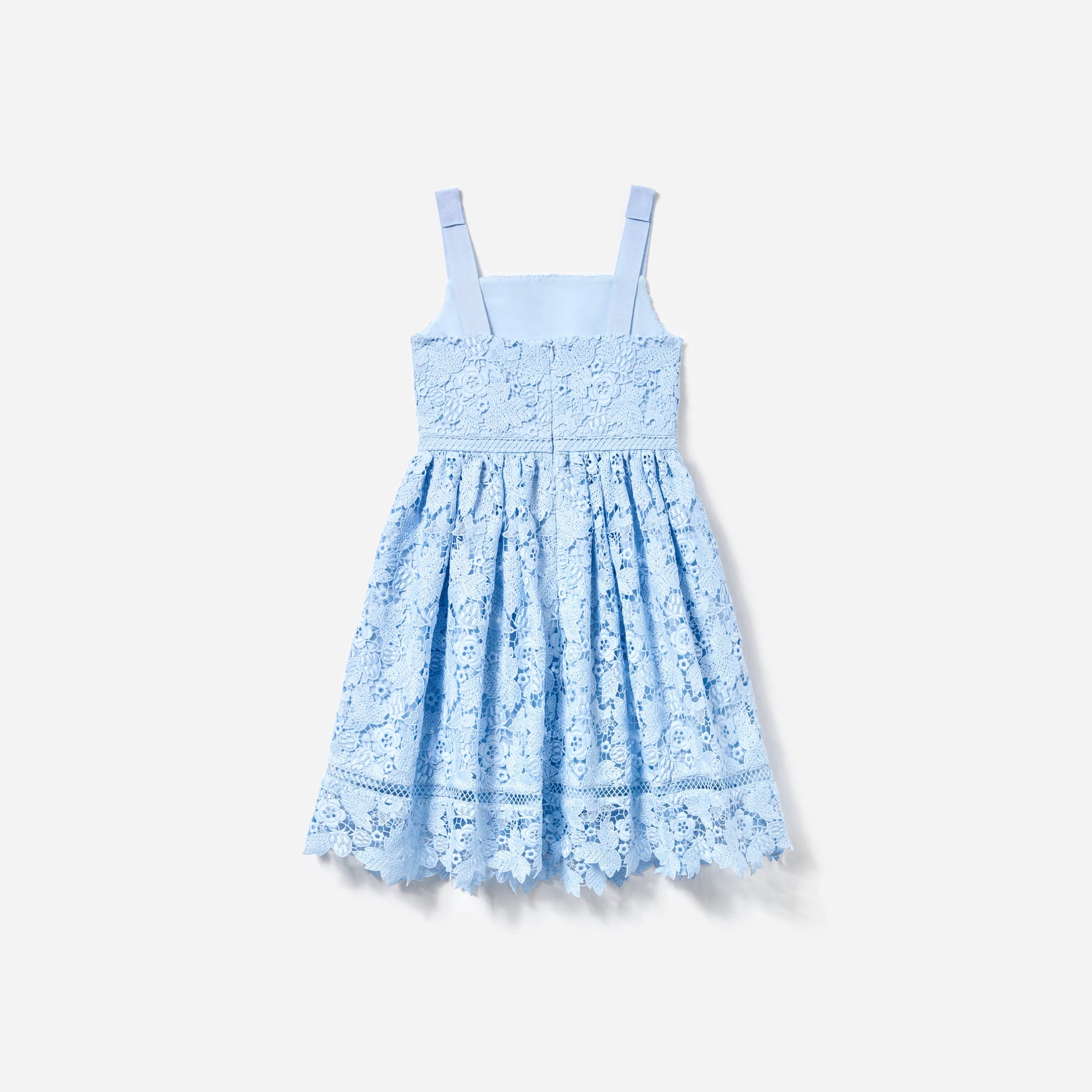 Side view of a woman wearing the Blue Butterfly Lace Dress