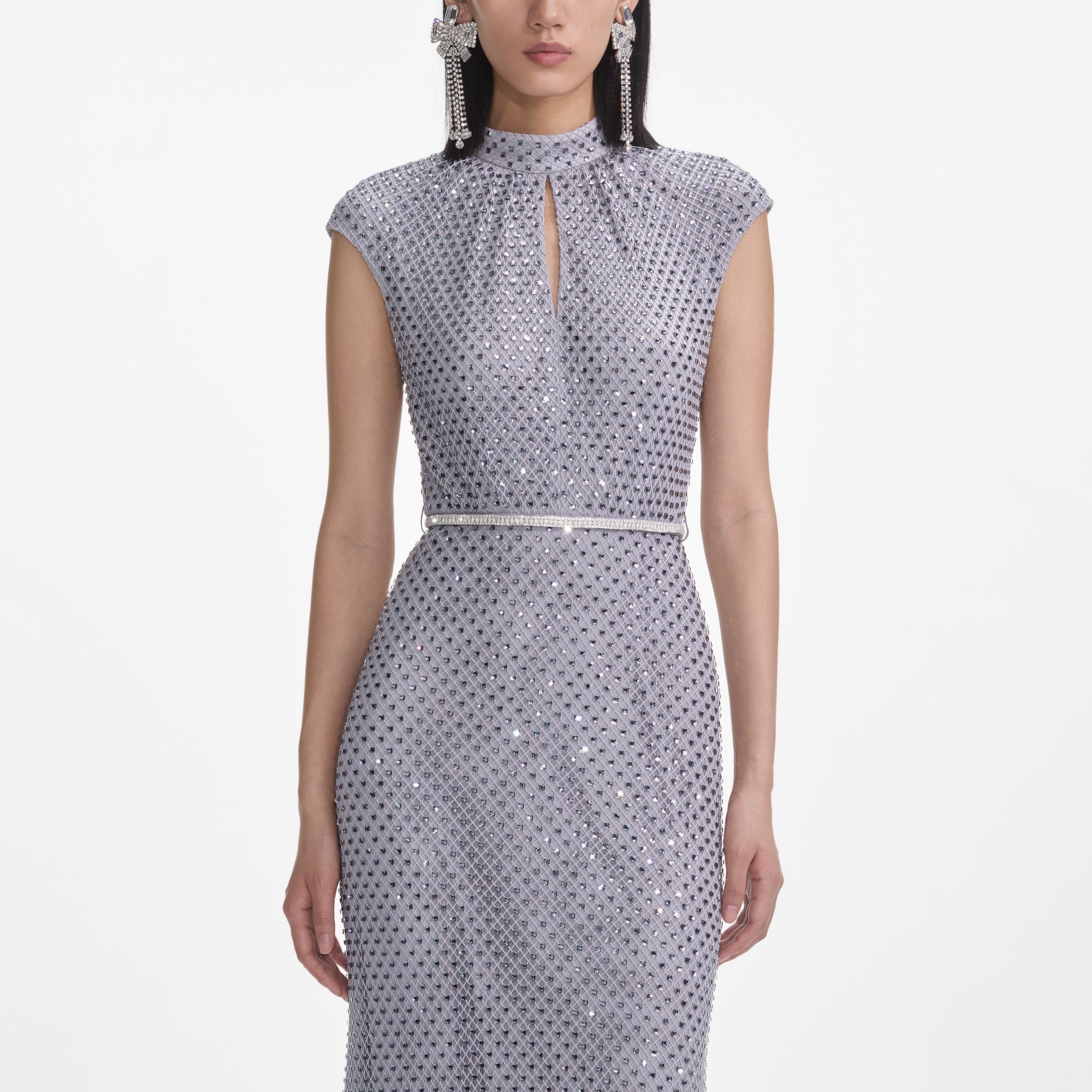 A close up of a woman wearing the Grey Rhinestone Fishnet Midi Dress
