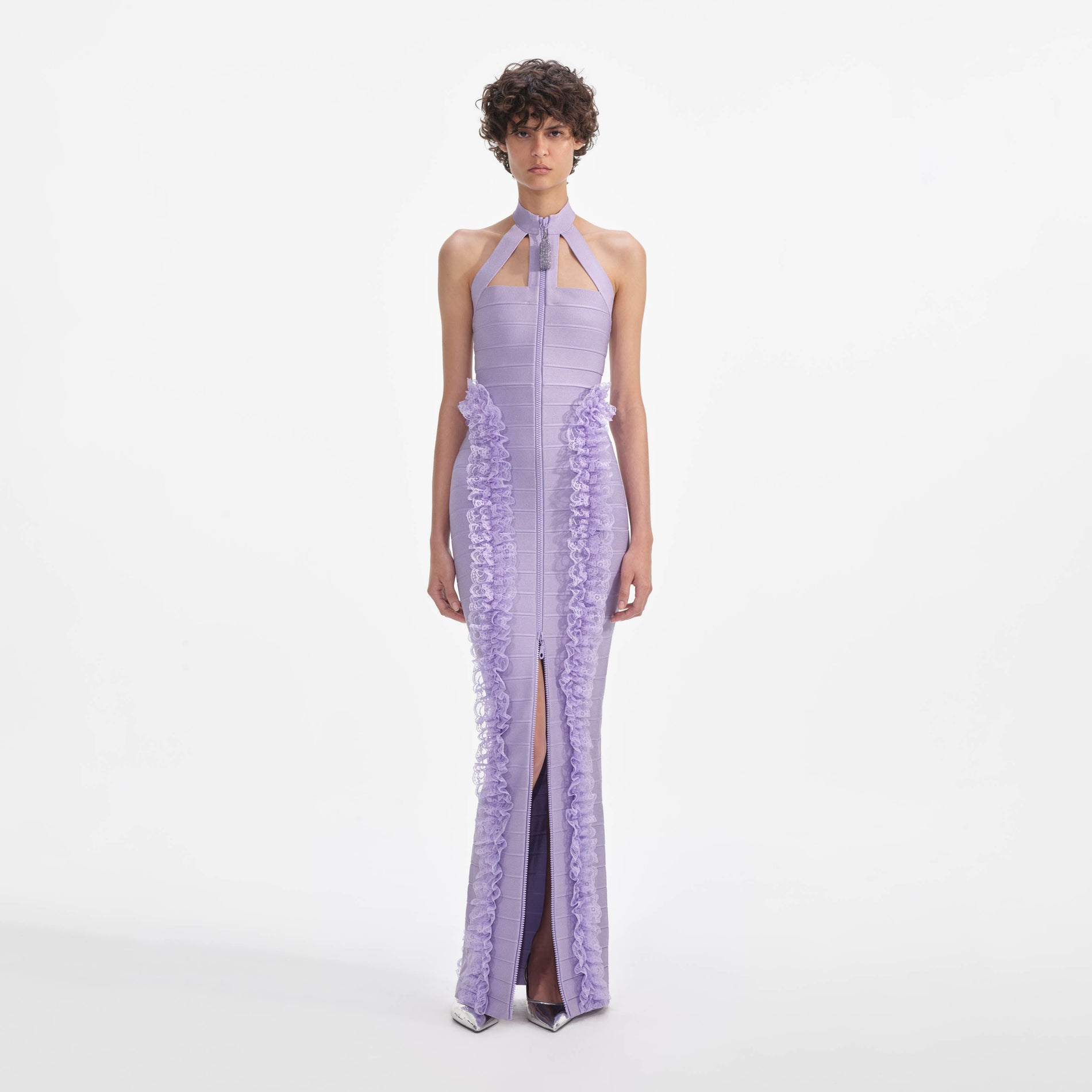 Front view of a woman wearing the Purple Knit Zip Ruffle Maxi Dress