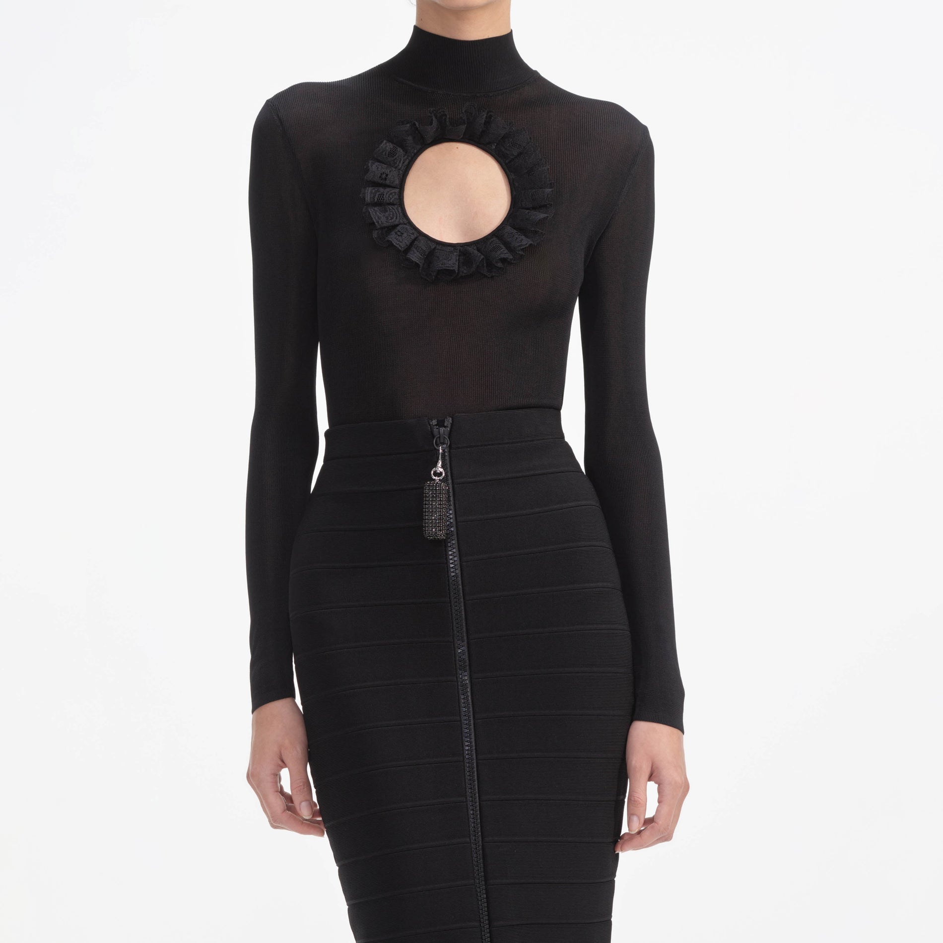 A close up of a woman wearing the Black Ruffle Knit Midi Skirt
