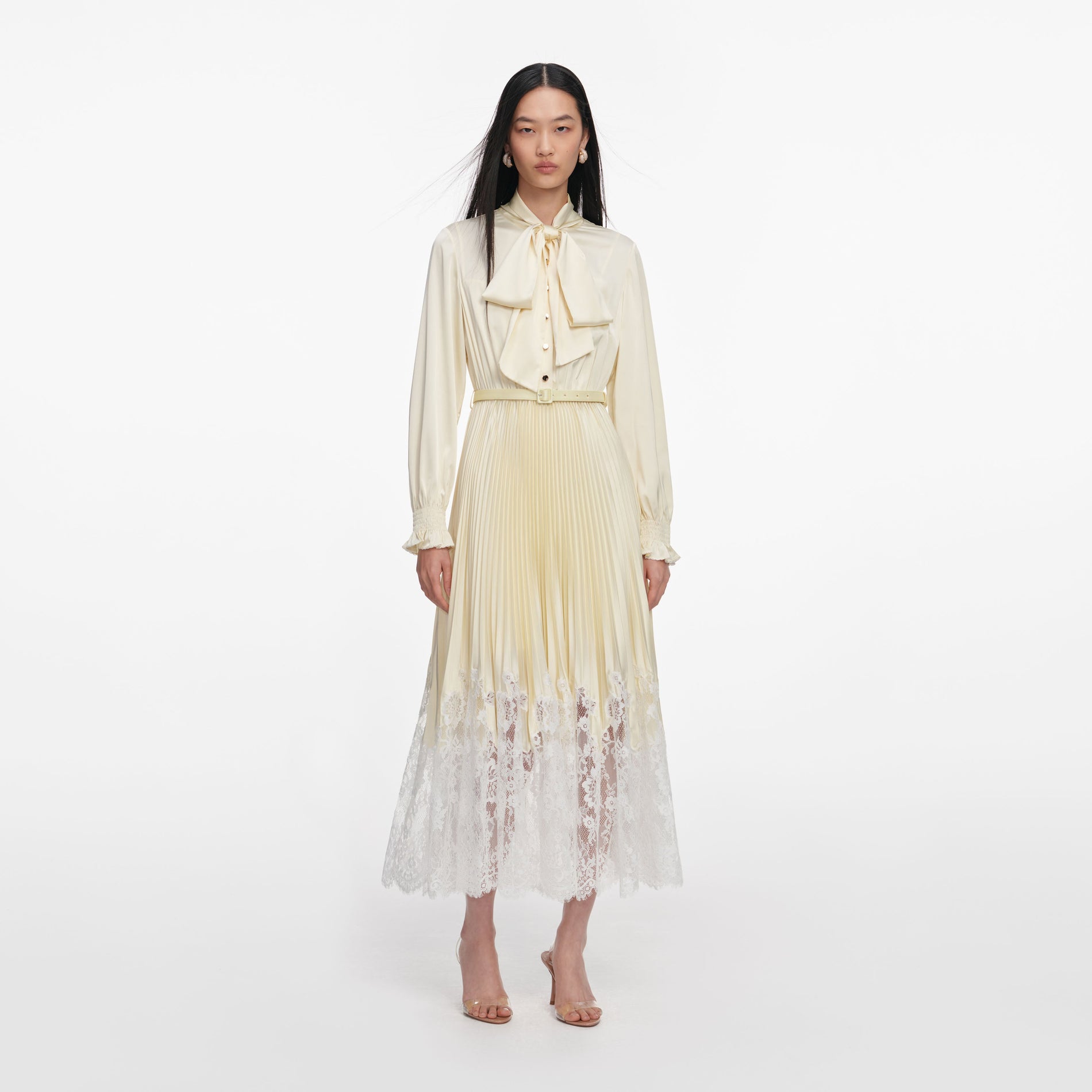 Front view of a woman wearing the Yellow Satin Lace Midi Dress