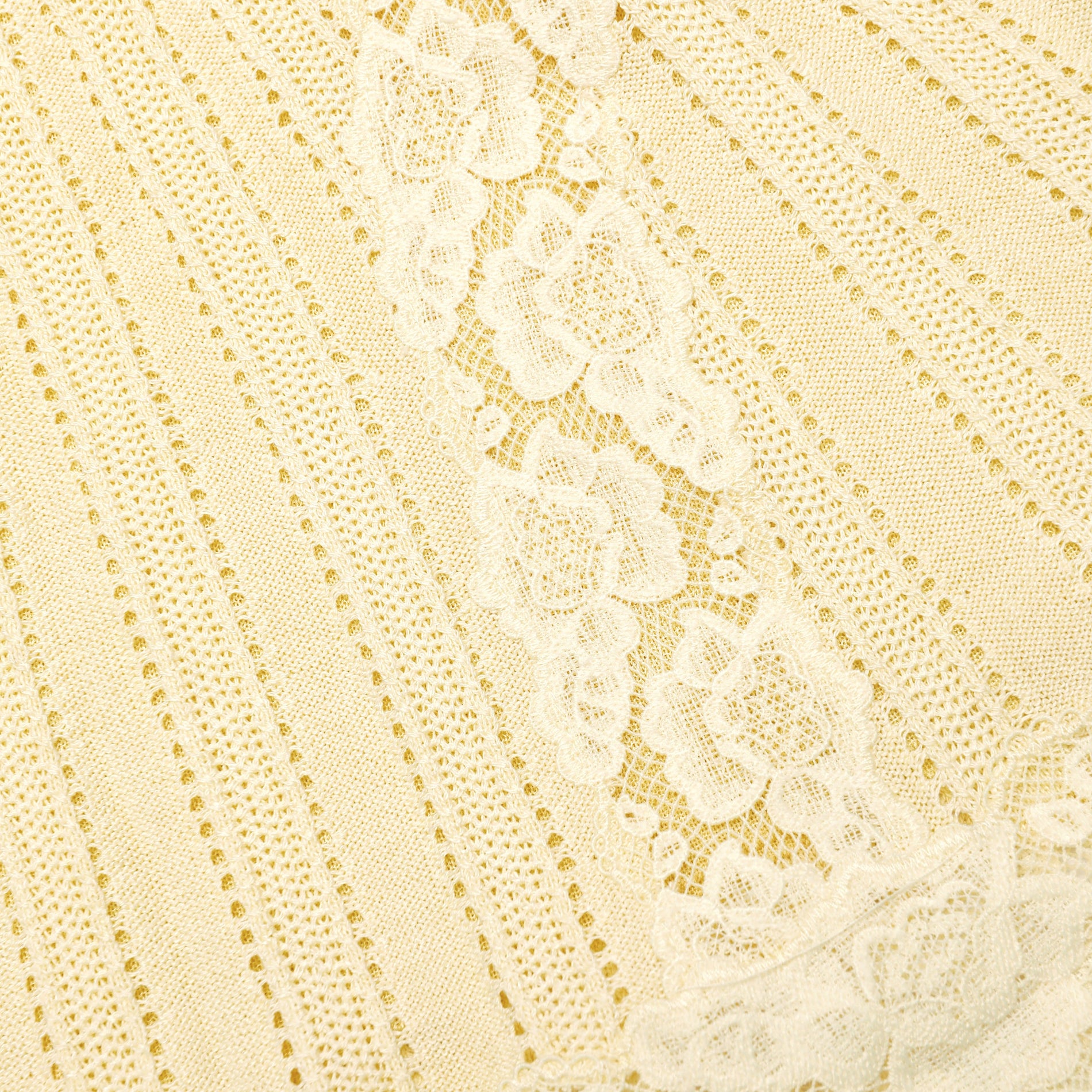 A close up of the fabric for the Yellow Pointelle Knit Mini Skirt