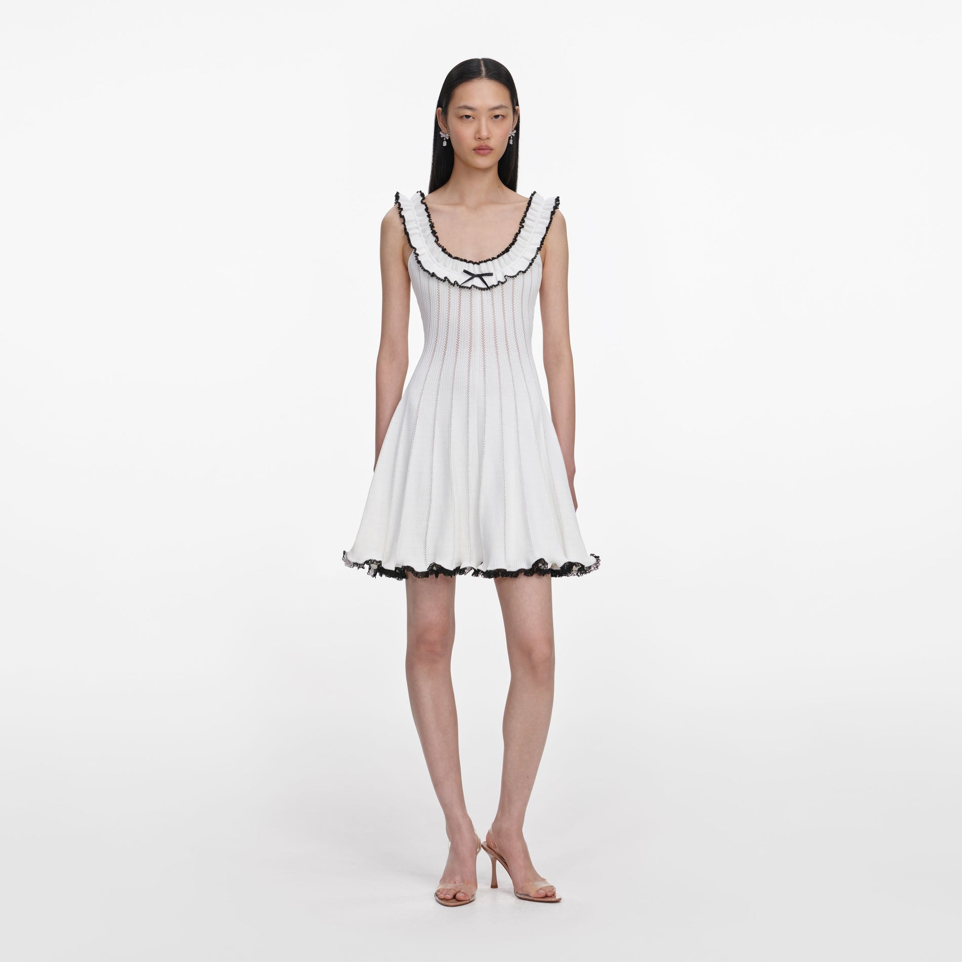 Front view of a woman wearing the White Contrast Trim Knit Mini Dress