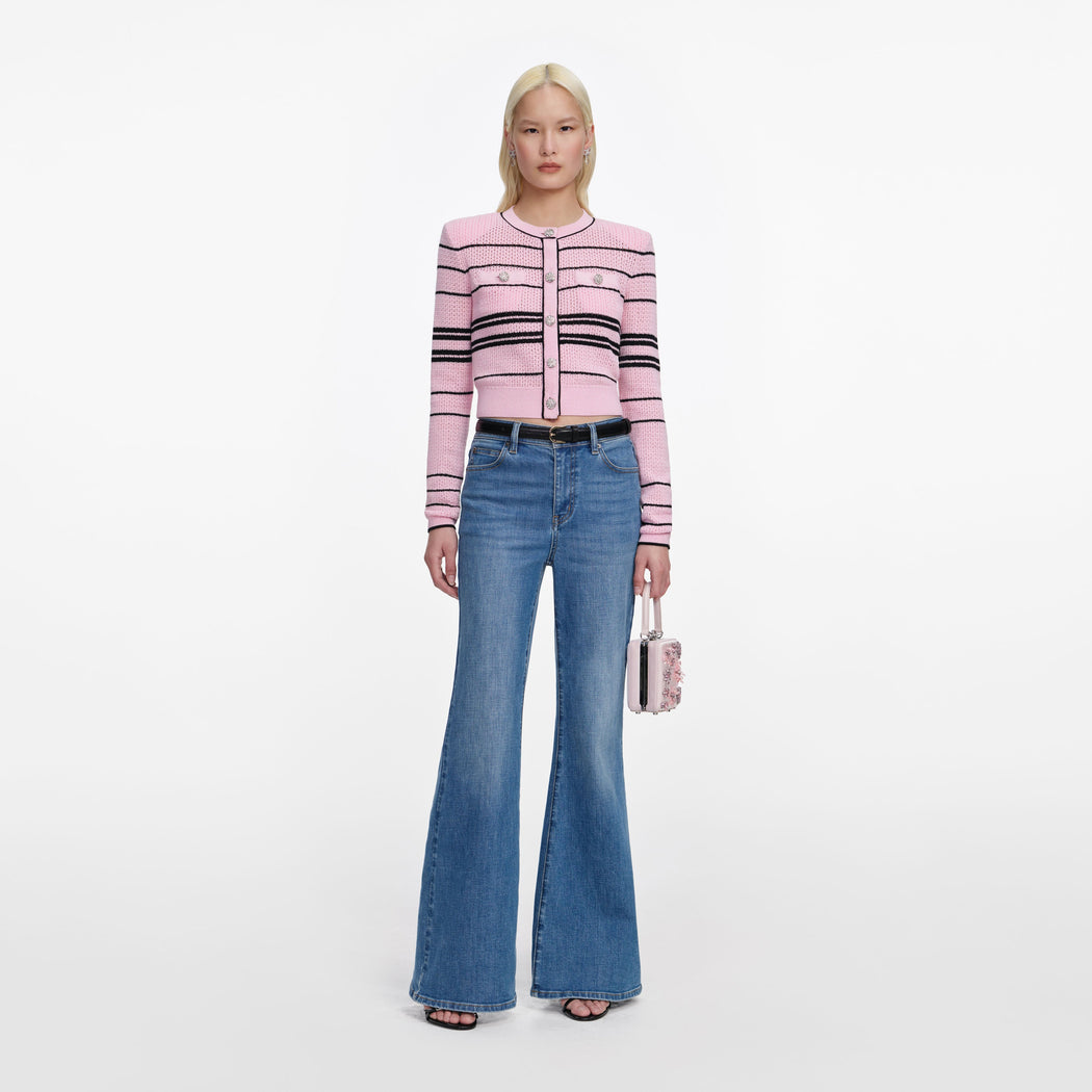 Front view of a woman wearing the Pink Stripe Cardigan