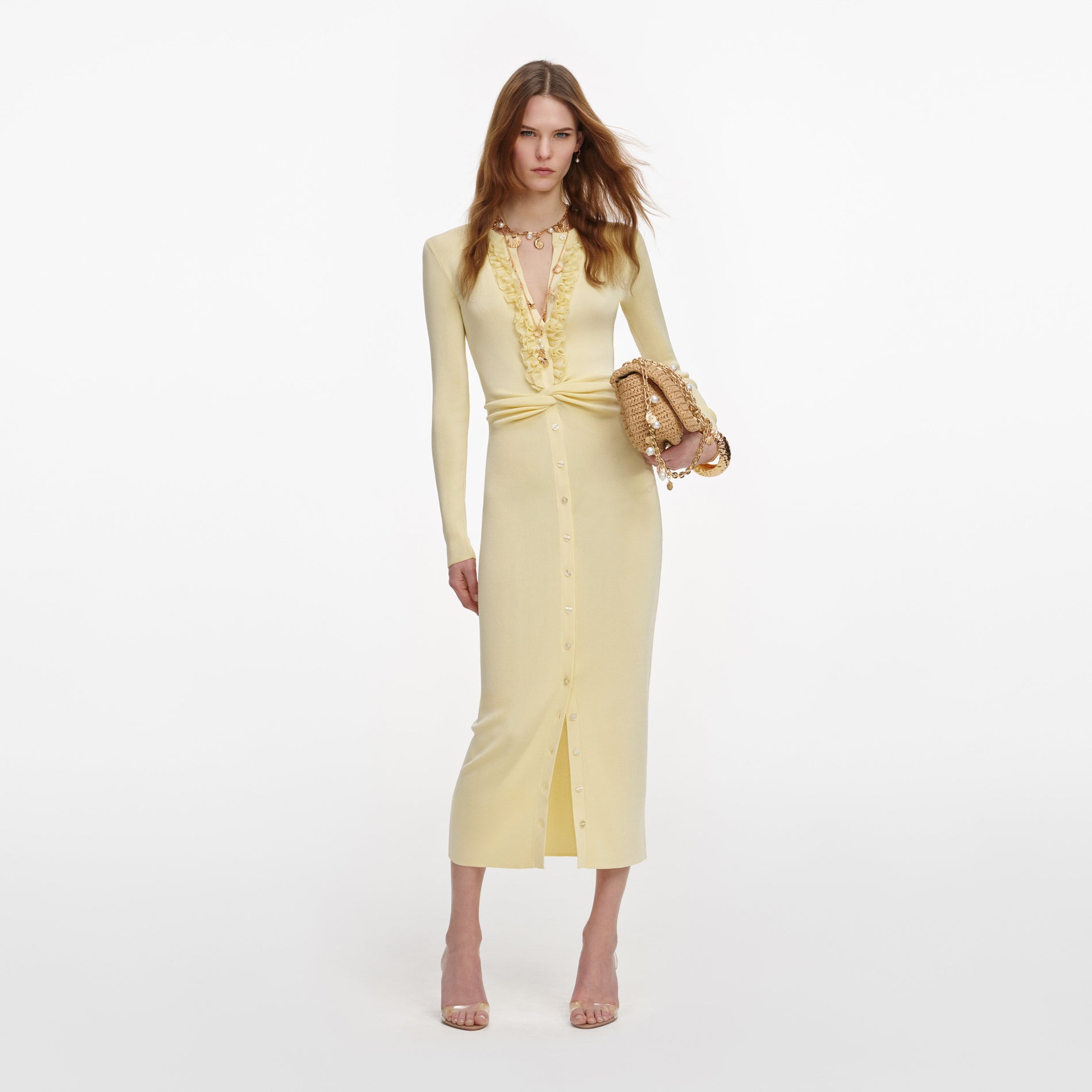 Front view of a woman wearing the Yellow Viscose Knit Ruffle Midi Dress