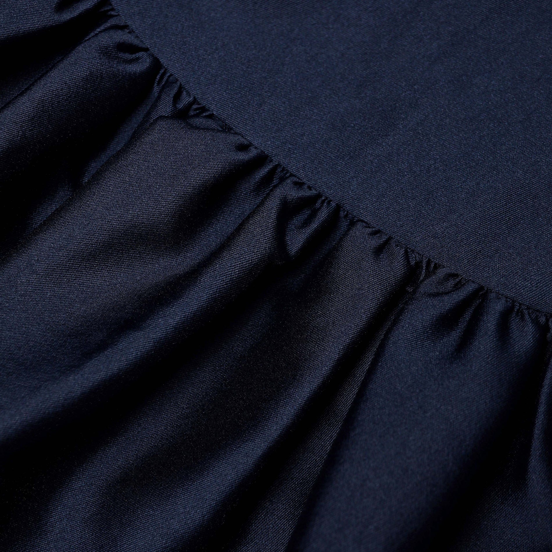 A close up of the fabric for the Navy Taffeta Skirt