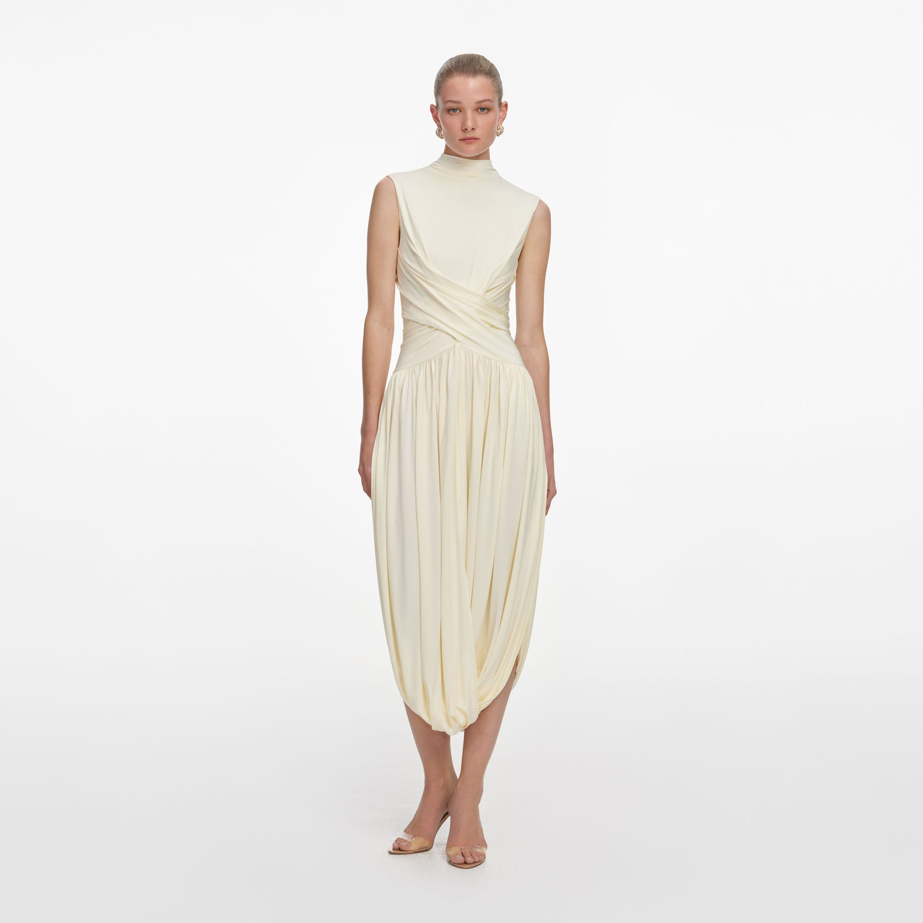 Front view of a woman wearing the Yellow Jersey Wrap Midi Dress