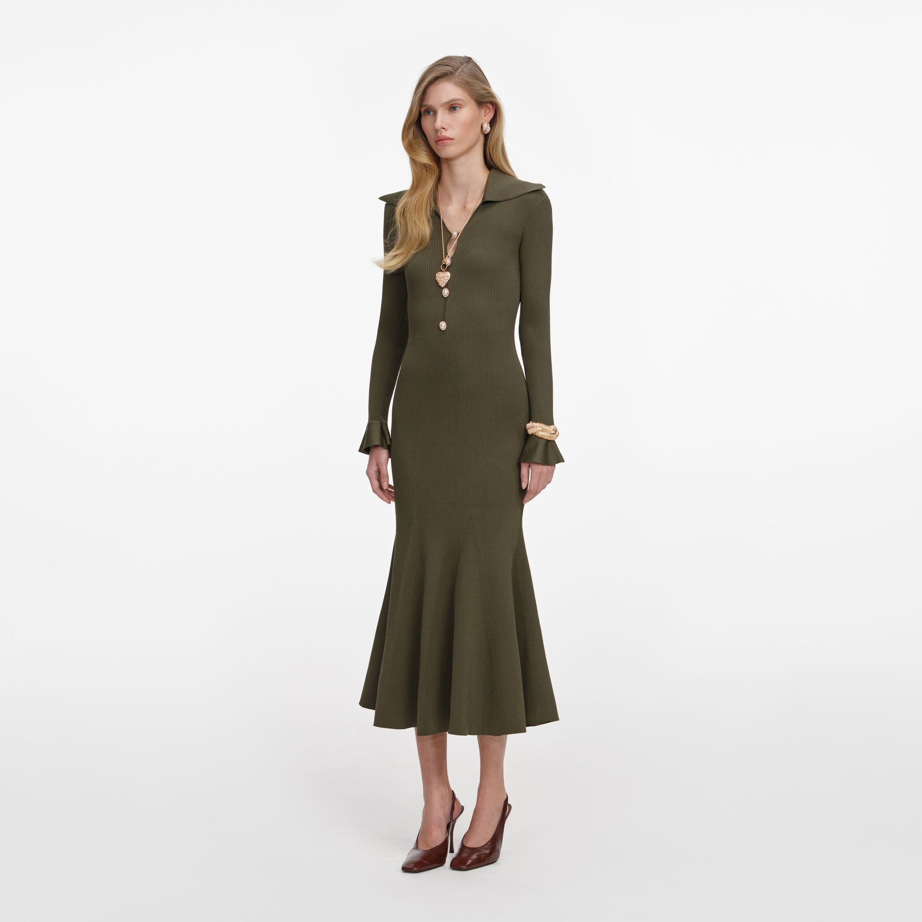 Side view of a woman wearing the Khaki Pointelle Knit Midi Dress