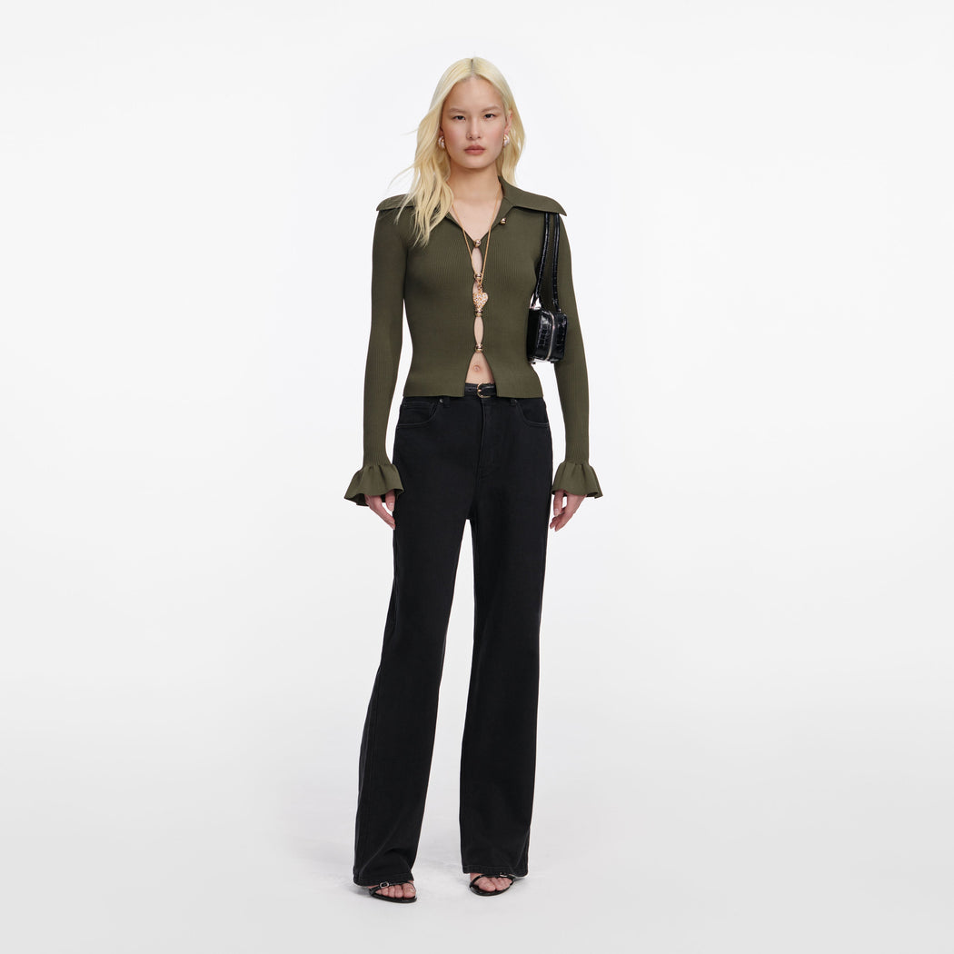 Front view of a woman wearing the Khaki Button Down Knit Top