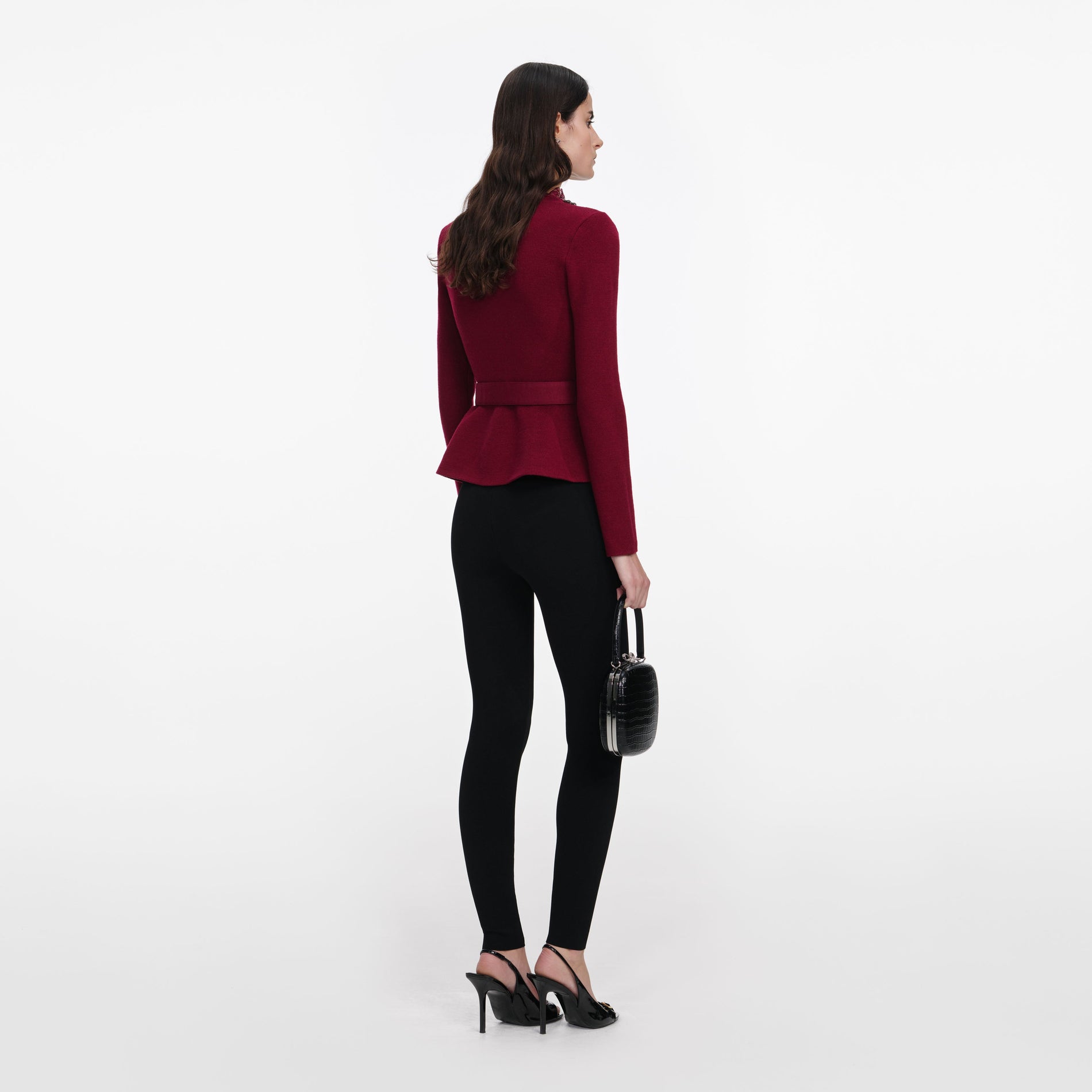 Back view of a woman wearing the Burgundy Crystal Trim Cardigan