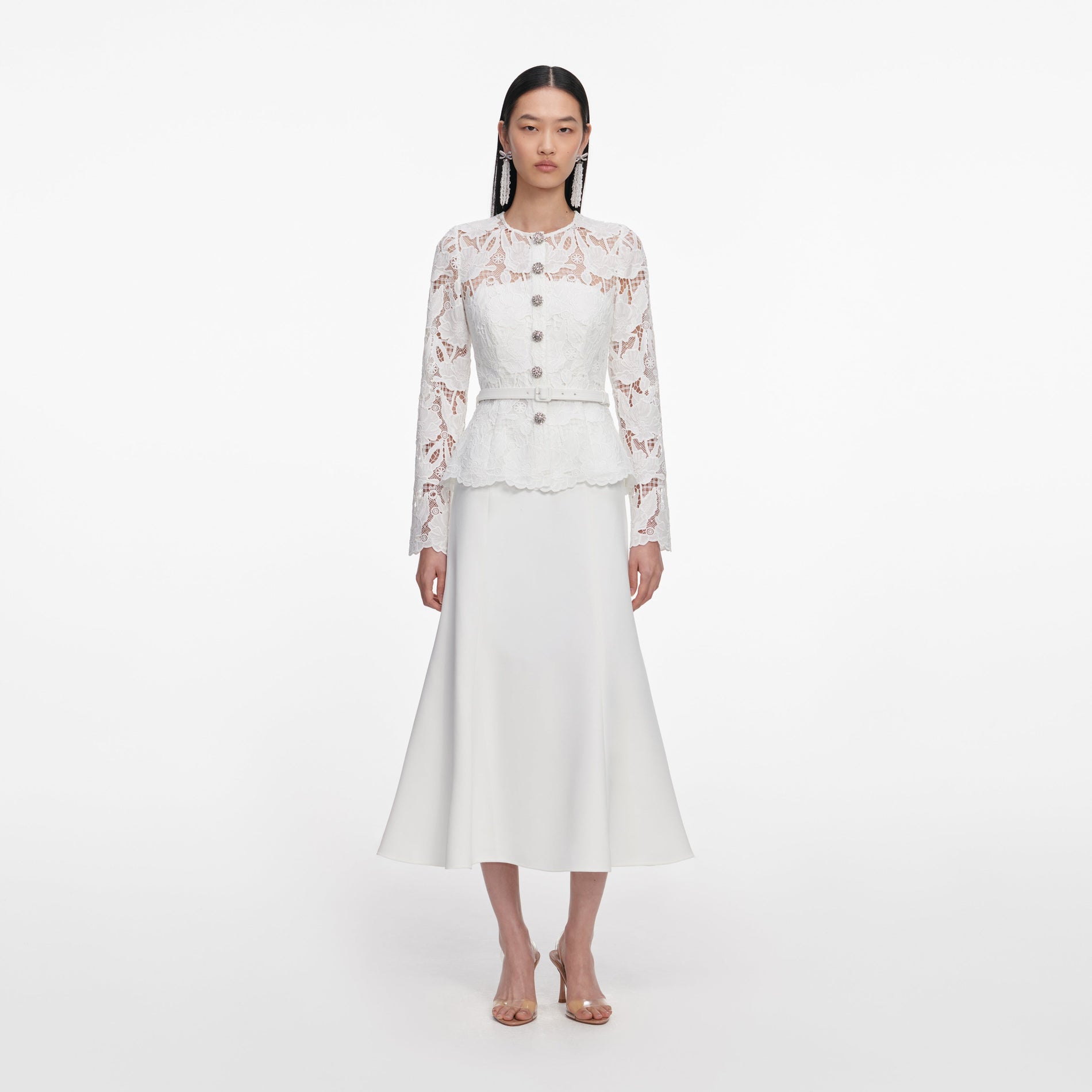 Front view of a woman wearing the White Lace Crepe Midi Dress