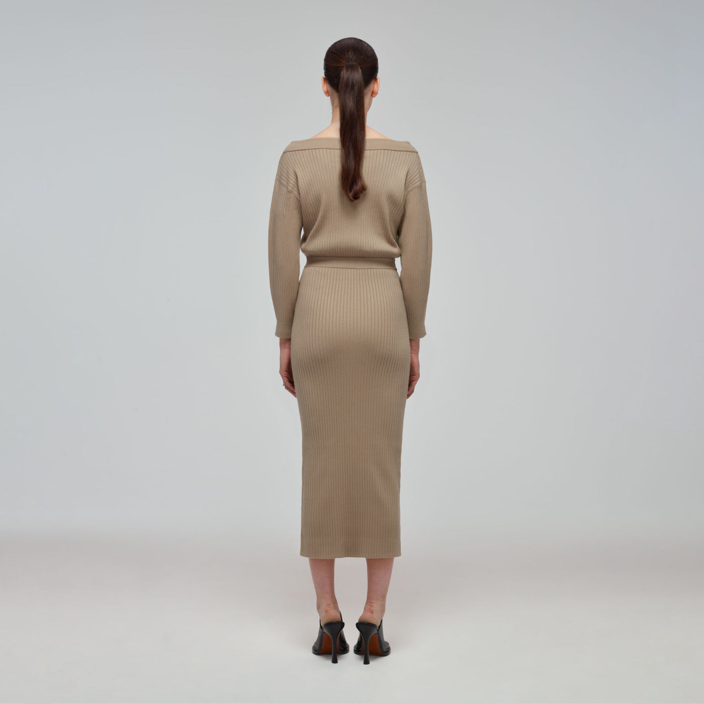 A woman wearing the Taupe Ribbed Knit Slouchy Midi Dress