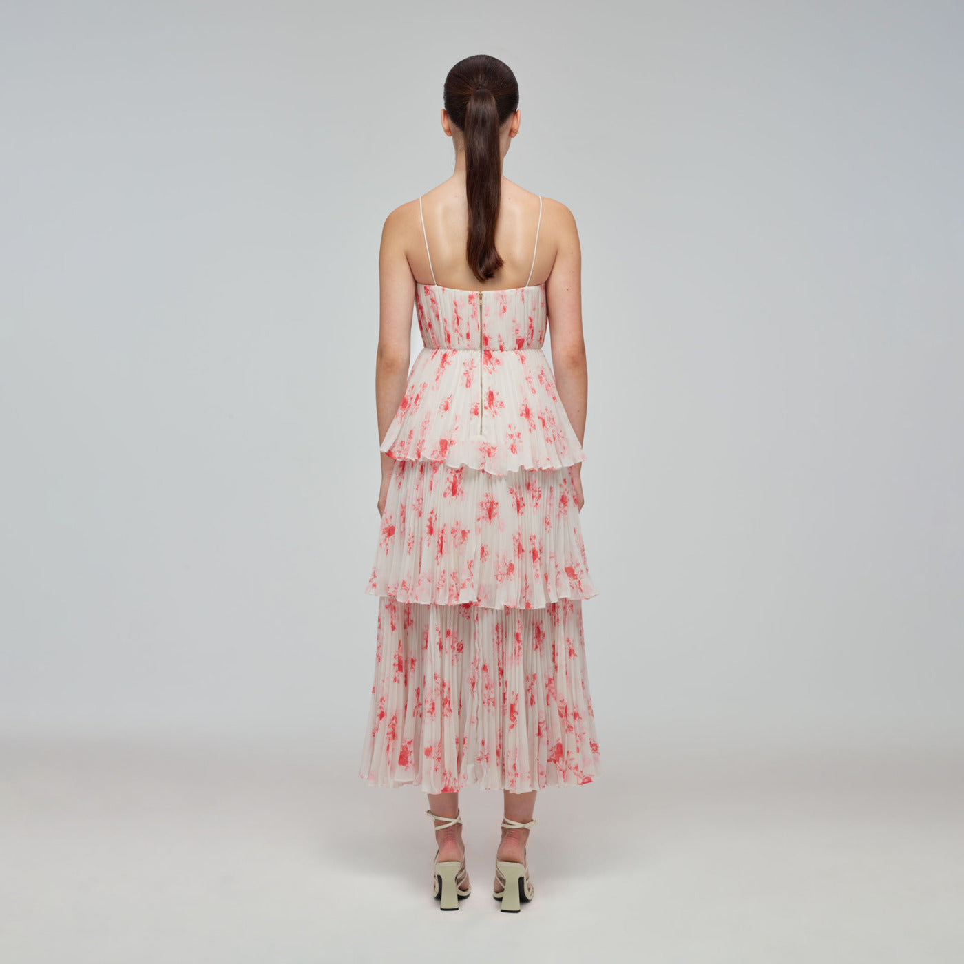 A woman wearing the Floral Print Chiffon Tiered Midi Dress